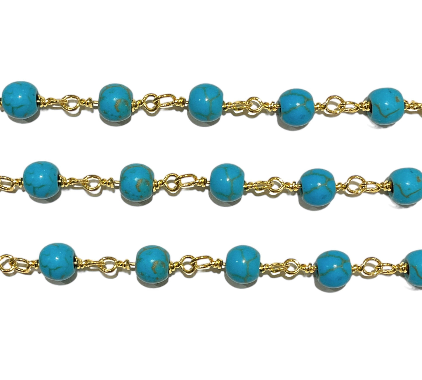 Chaîne avec boule en Howlite turquoise au mètre laiton